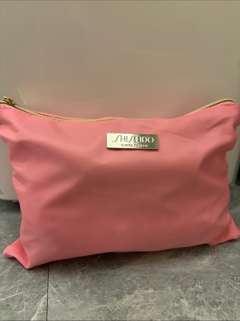 Shiseido Coral Pink Cosmetic Case with goodies